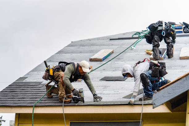 Professional Roofing technician working in Helena, OK